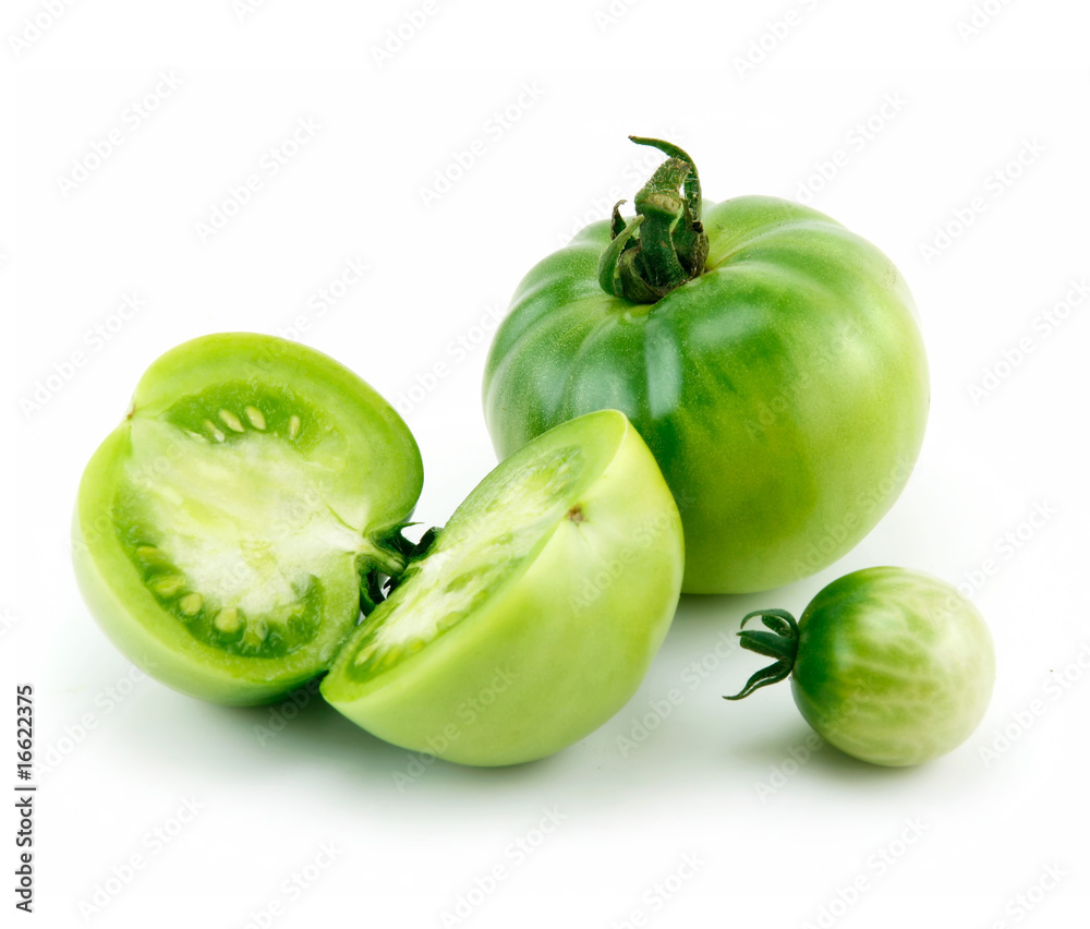Ripe Green Sliced Tomatoes Isolated on White Ripe Green Sliced Tomatoes Isolated on White