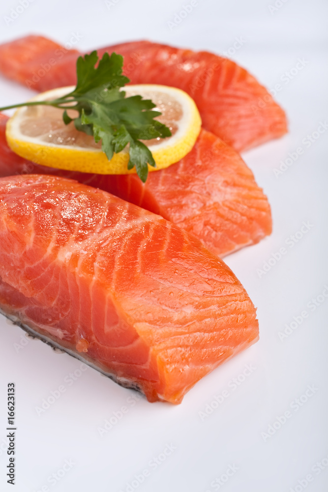 three salmon pieces on white background three salmon pieces on white background