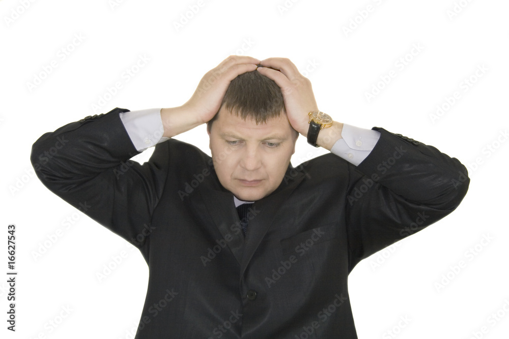 Stressed out young business man over white background Stressed out young business man over white background