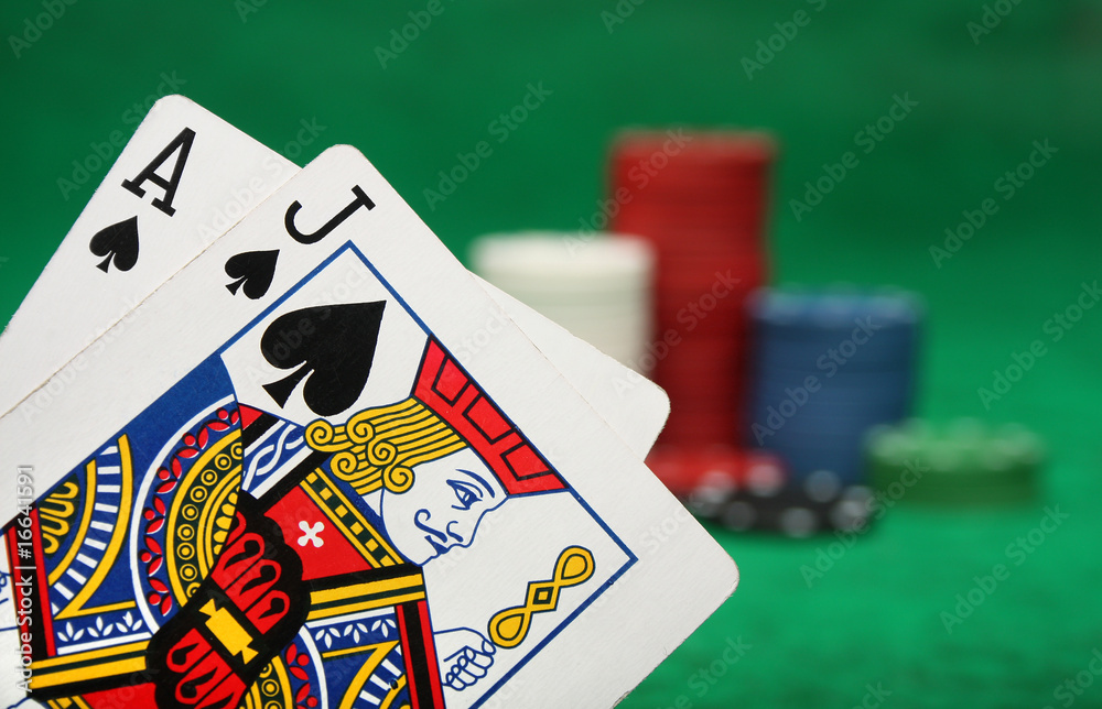 A winning blackjack hand with gambling chips - obrazy, fototapety, plakaty 