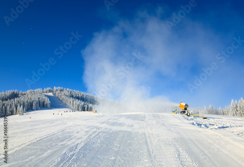 Snowmaking on a mountain ski resort © wildman