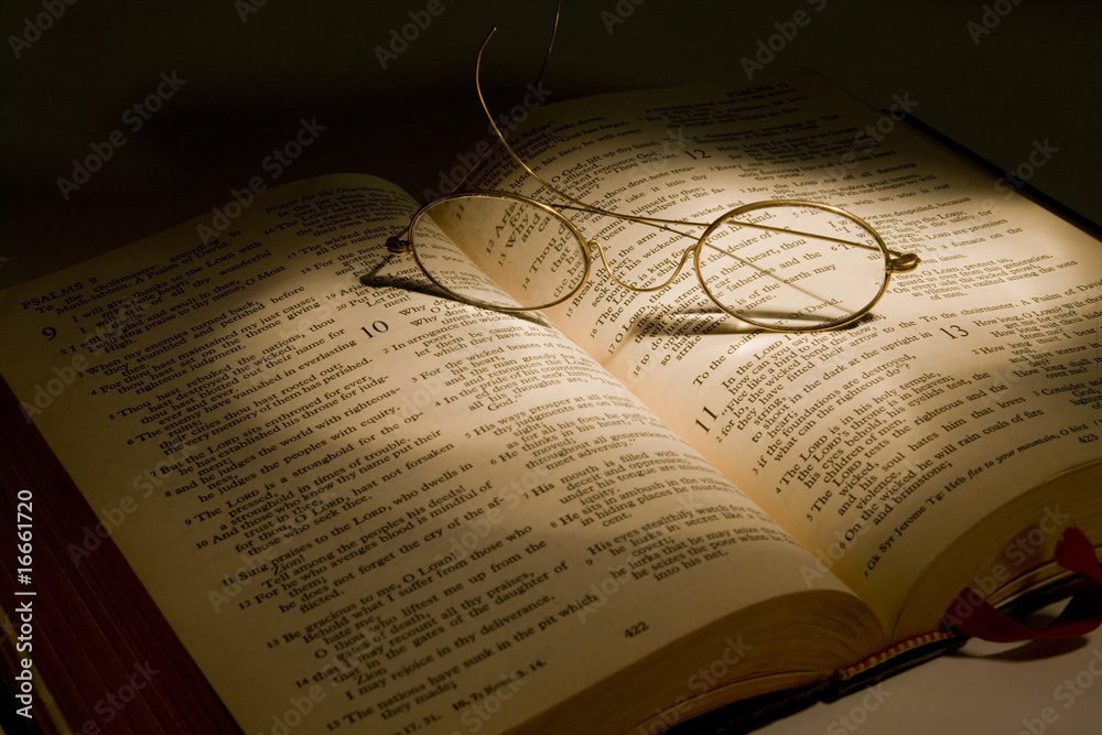 Fototapeta premium Christian Bible With Reading Glasses