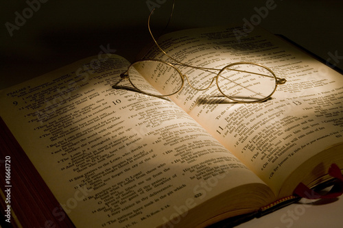 Christian Bible With Reading Glasses