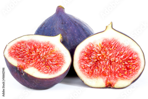 Fig with halves isolated on white background