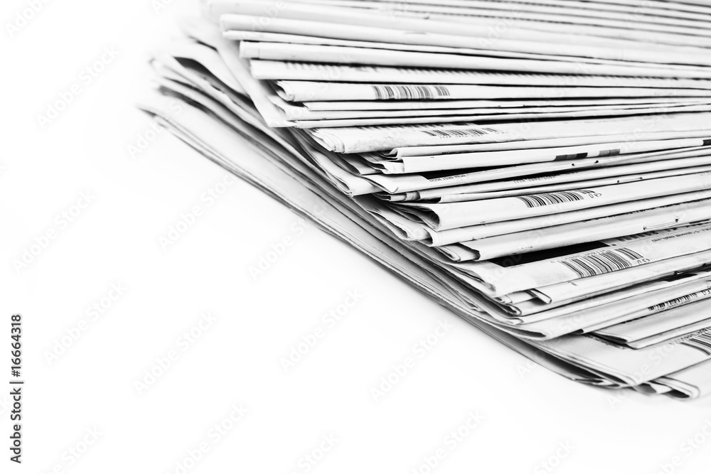 Stack of isolated newspapers in black and white Stack of isolated newspapers in black and white