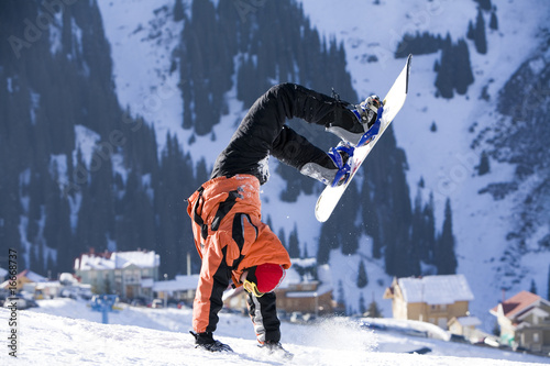 Break dance. Snowboarder, stunt. Tien Shan