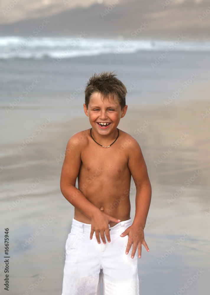 smiling boy in the towel smiling boy in the towel
