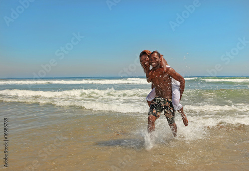 Happy African American Couple at the Beach