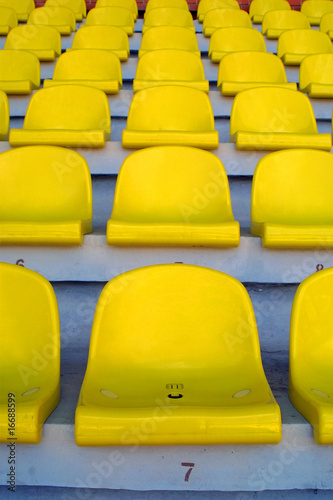 Yellow empty stadium seats