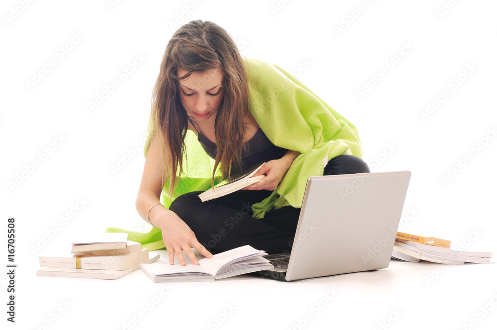 one young girl work on laptop isolated on white one young girl work on laptop isolated on white