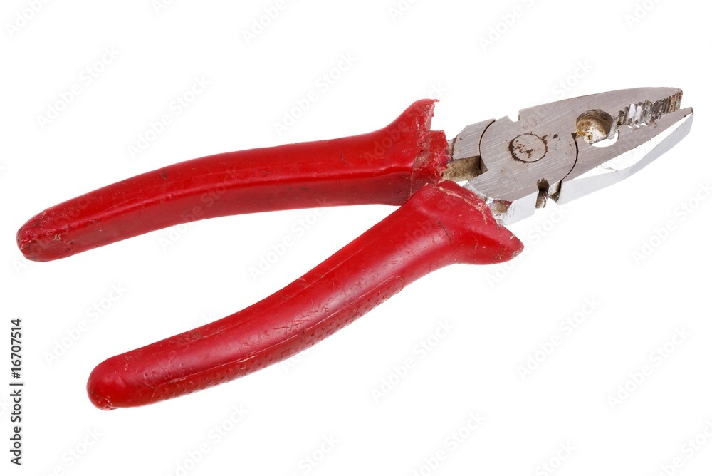 Old pliers with red handles, isolated on white background Old pliers with red handles, isolated on white background