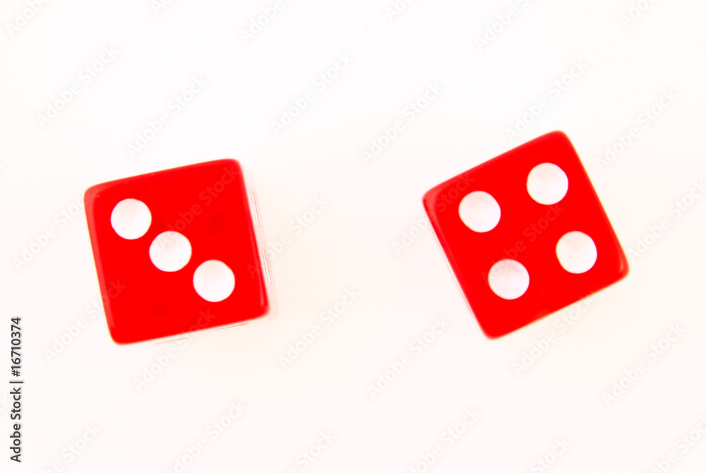 2 Dice close up - showing the numbers 4 and 3 isolated 2 Dice close up - showing the numbers 4 and 3 isolated