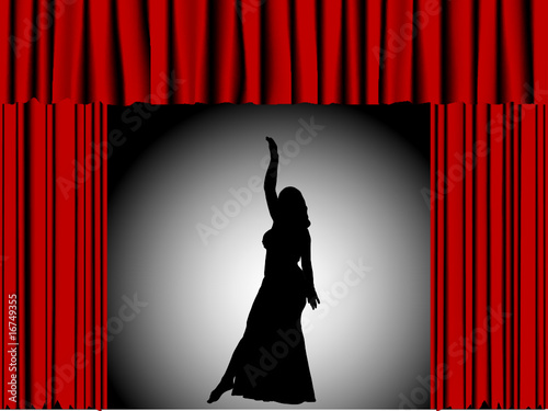 Silhouette of dancing girl in theater