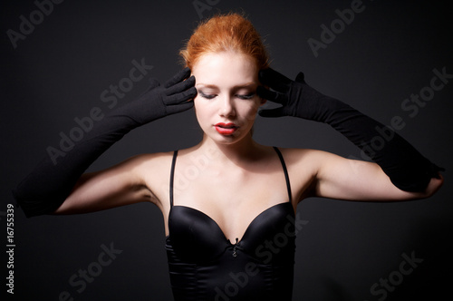 Portrait of attractive redhead model