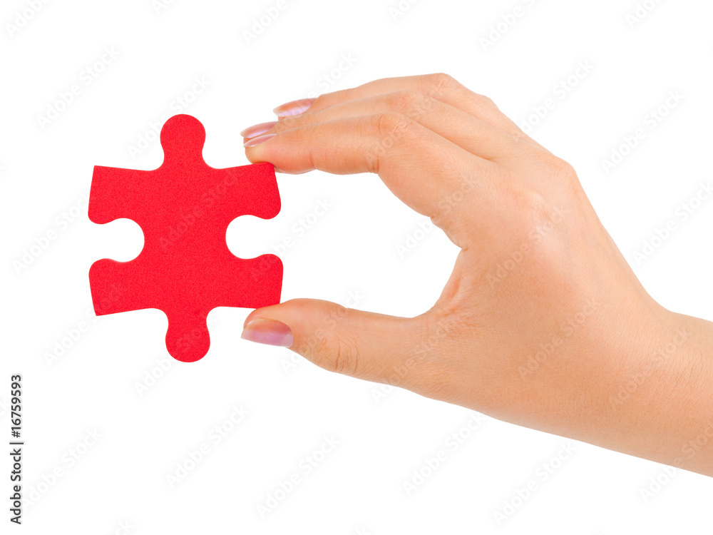 Hand with puzzle Hand with puzzle