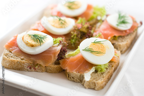 Canapes with smoked salmon and eggs
