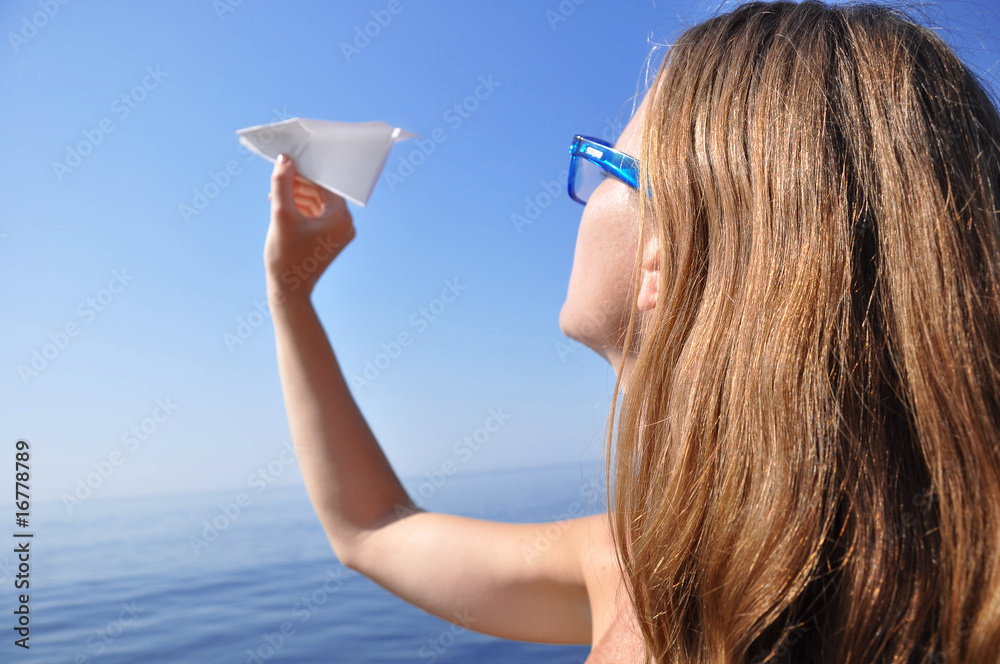 throwing a paper plane