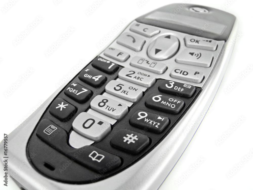 close of a modern handset phone isolated on white close of a modern handset phone isolated on white
