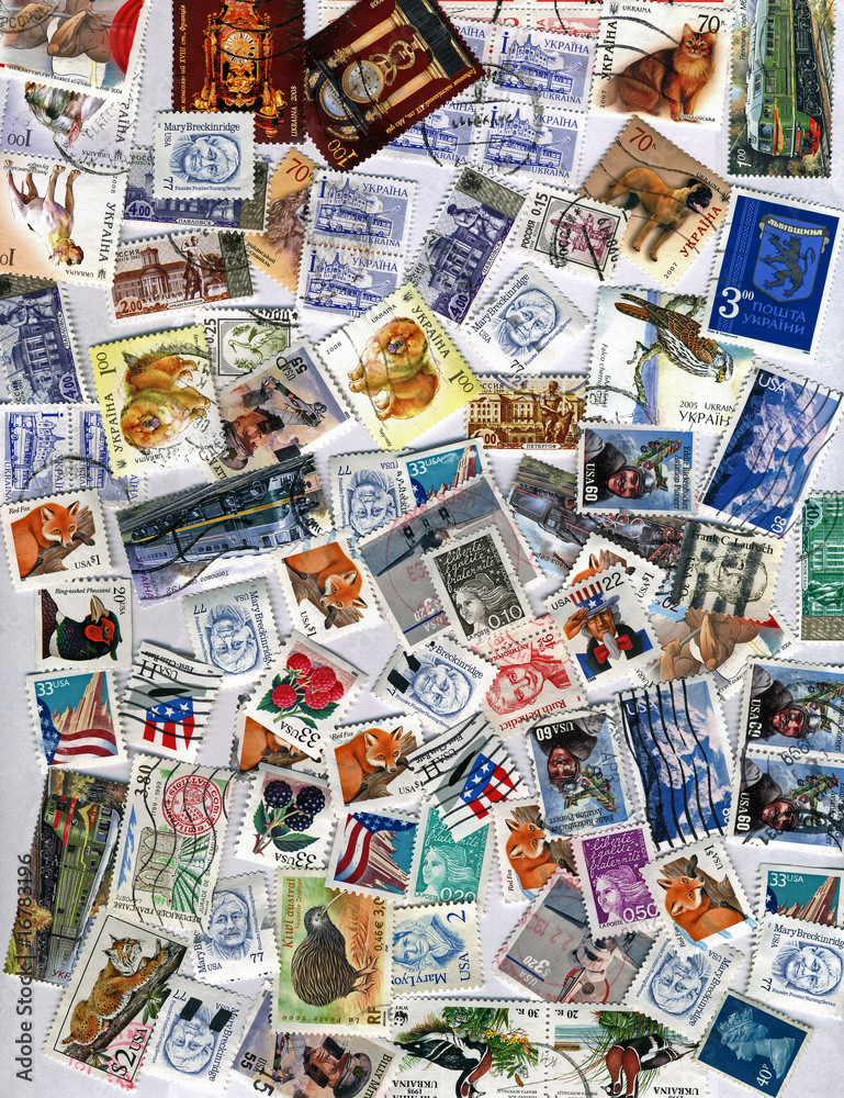 pile of different colorful post stamps, paper texture, frame
