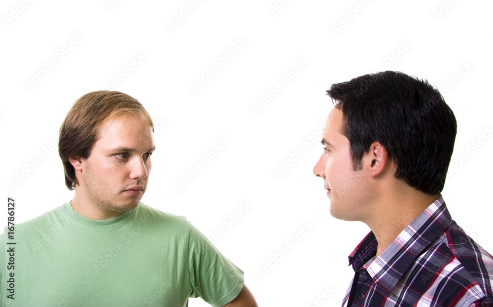 Two casual men posing, isolated over white background Two casual men posing, isolated over white background