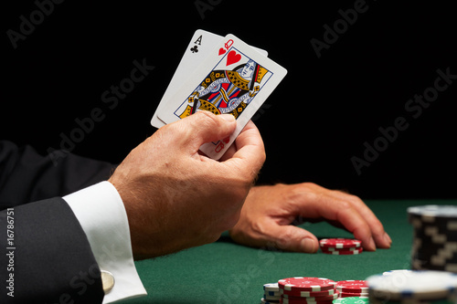 Blackjack hand of cards and casino chips