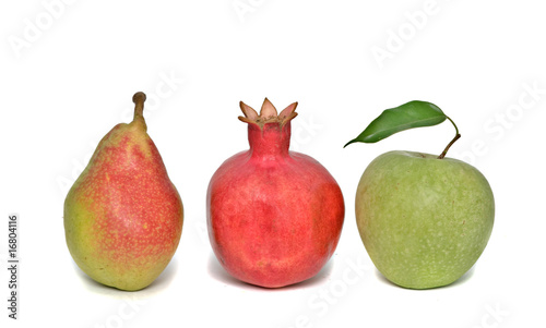 apple, pomegranate, and pear isolated on white background