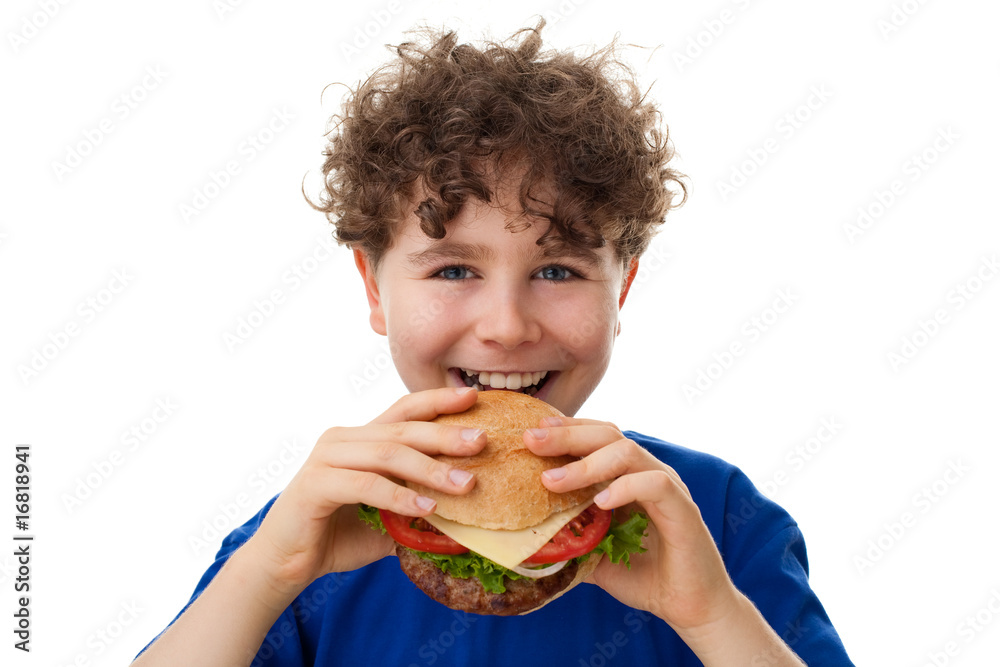 Kid eating healthy sandwich isolated on white Kid eating healthy sandwich isolated on white