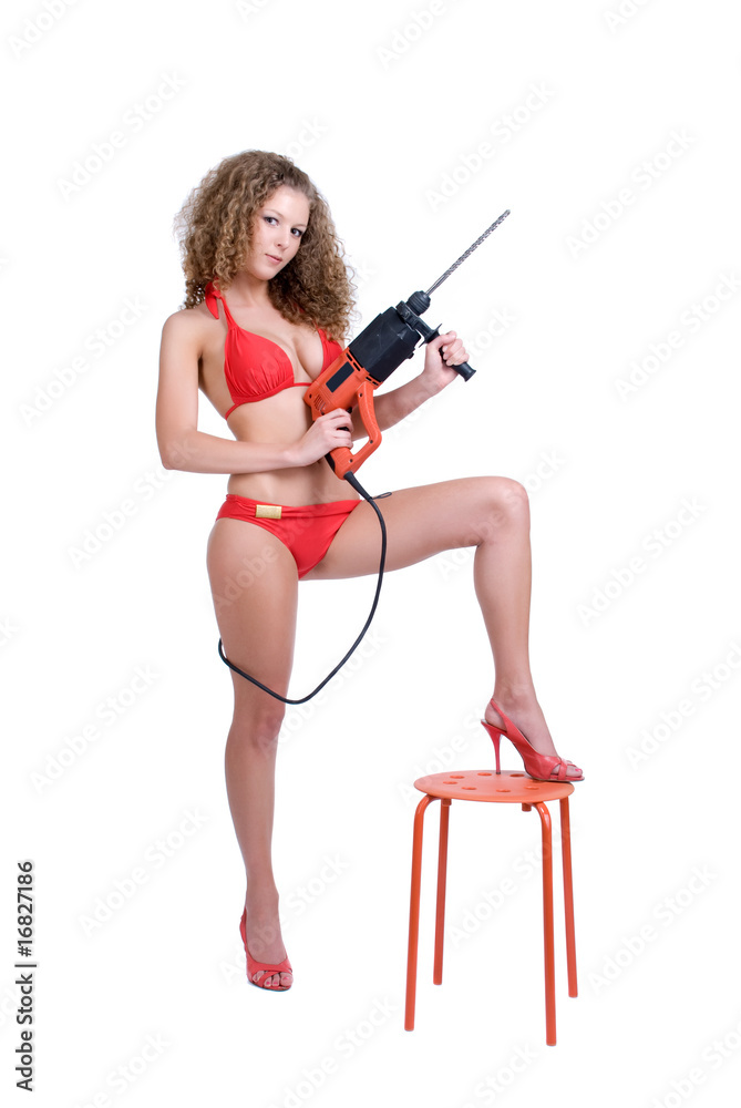 Beautiful girl holding perforator drilll with big auger Beautiful girl holding perforator drilll with big auger