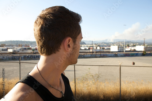 Young Man in front of Pollution