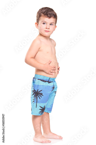 Adorable young boy posing isolated on white background