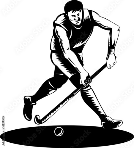 Field hockey player running with ball