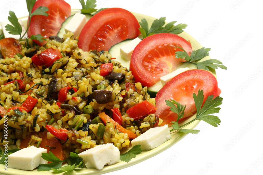 Delicious lunch. Fried rice with vegetables and herbs