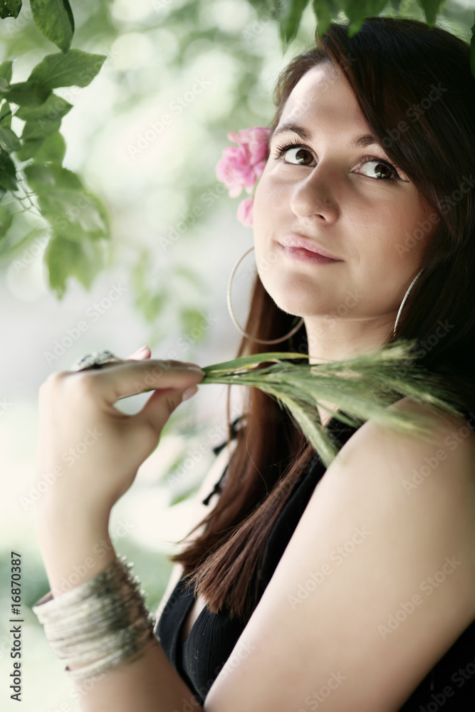 Romantic girl portrait in nature holding wheat Romantic girl portrait in nature holding wheat
