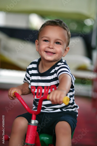 Little boy on a tricycle
