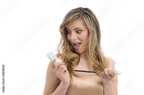 Young woman holding lightbulbs isolated