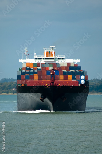 fully loaded container ship head-on