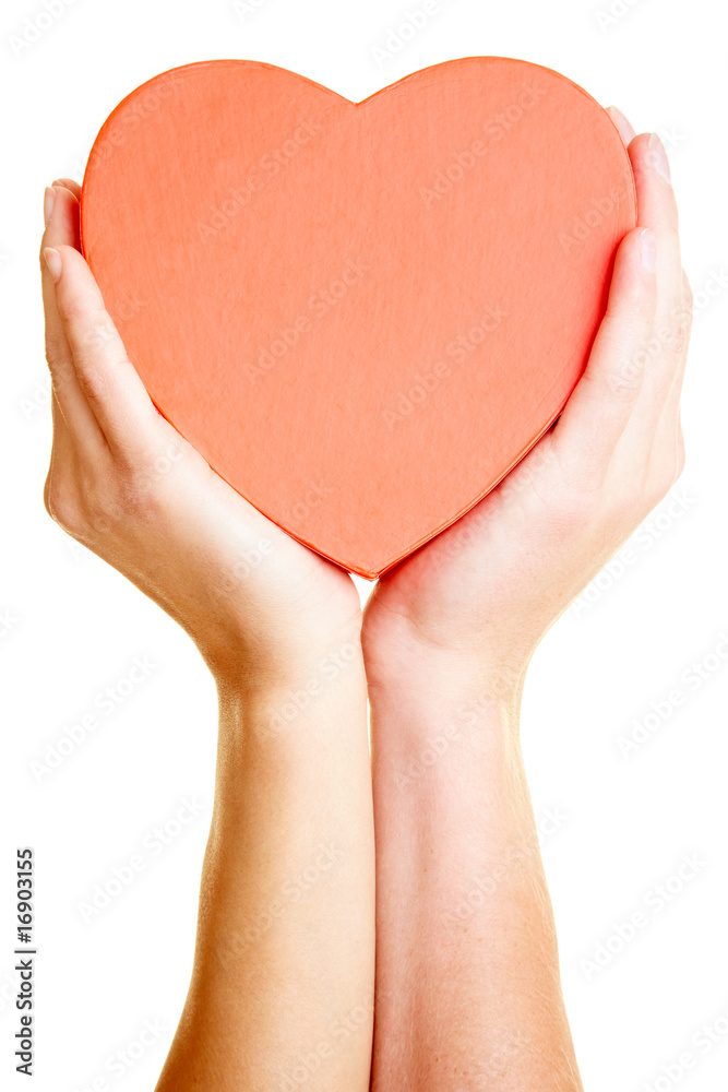 Obraz premium Holding a heart