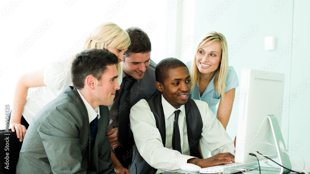 Fototapeta premium Businesspeople working with a laptop in the office