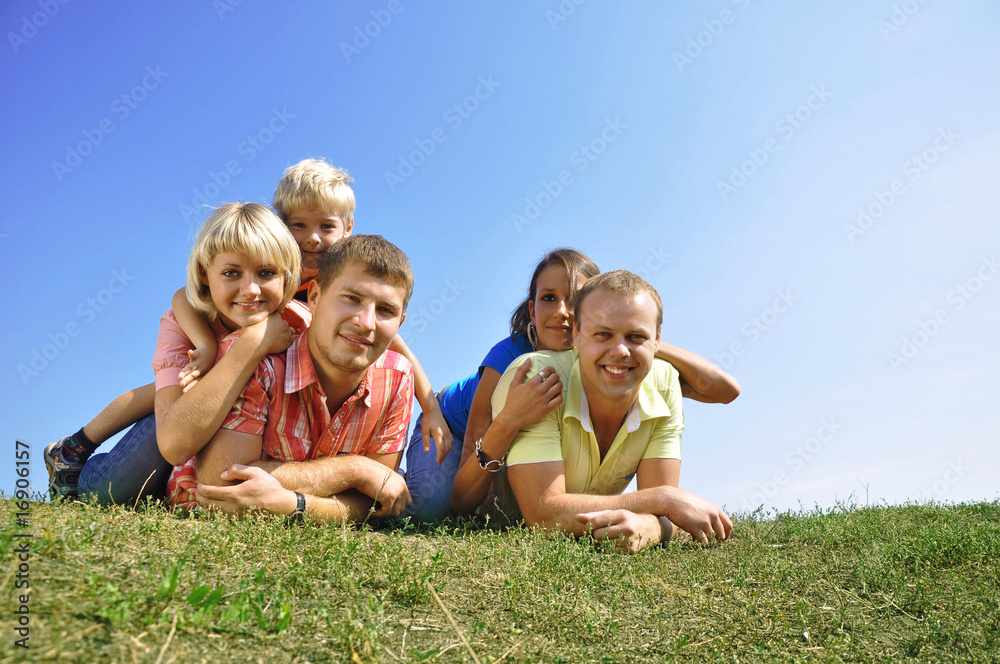 Group of four friends and kids