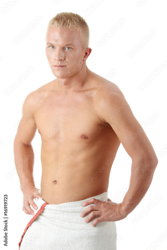 Muscular sexy man wrapped in the towel
