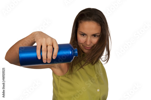 Woman holding blue bottle of water photo