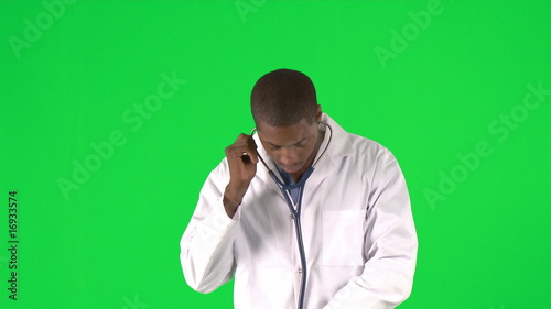Young doctor holding a stethoscope photo