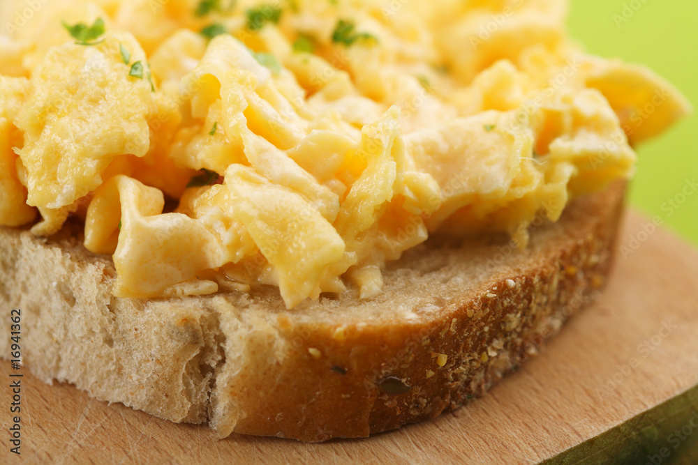 Healthy Breakfast, scrambled egg on bread Healthy Breakfast, scrambled egg on bread