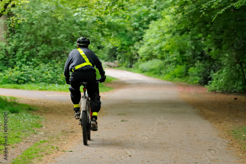 Cyclist riding a bicycle in a park