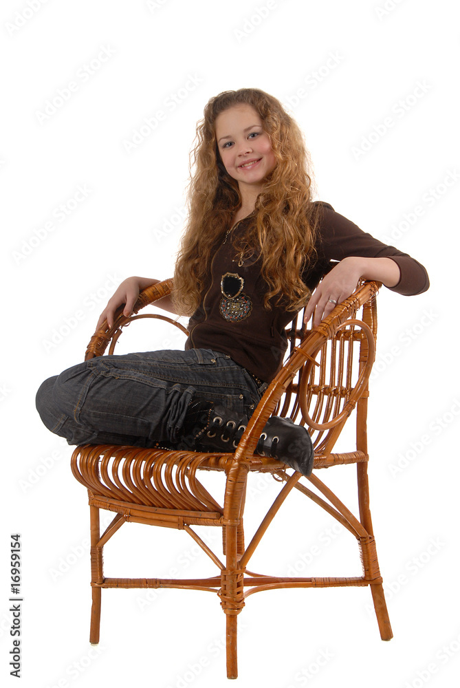 girl and a wicker chair girl and a wicker chair