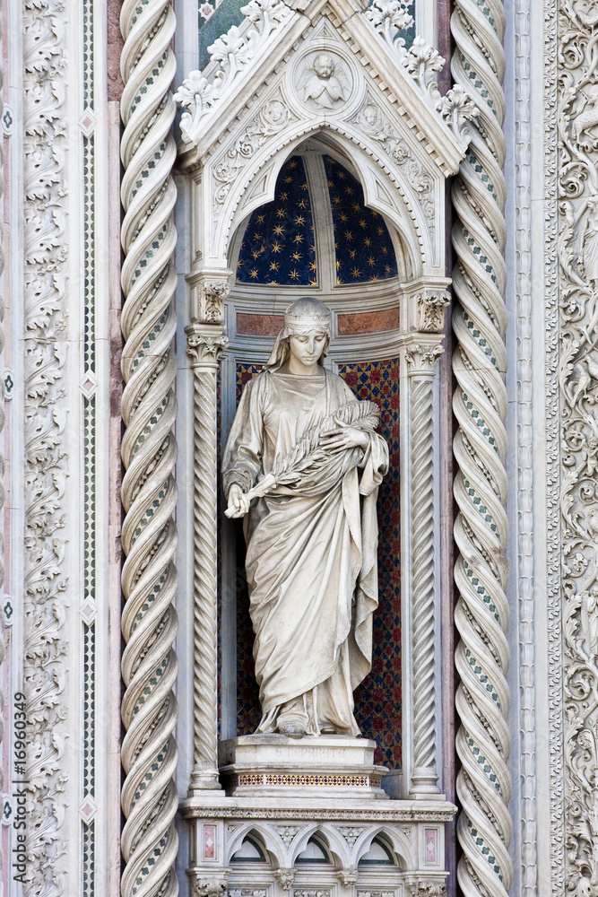 Statue in Alcove of Facade