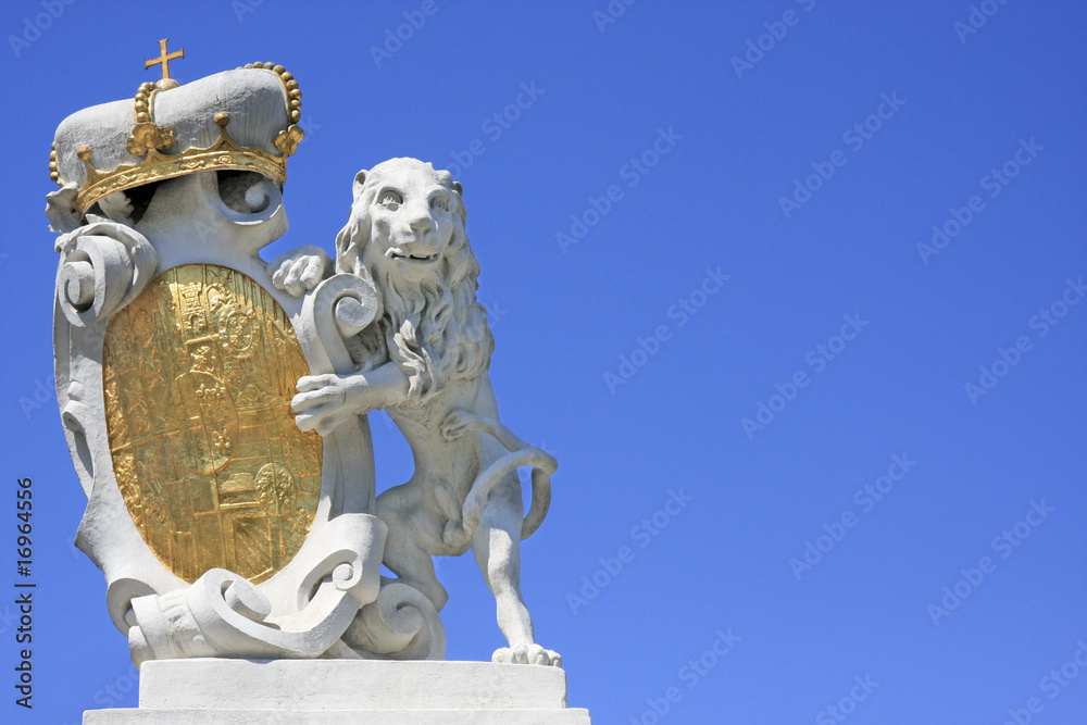 Obraz premium Löwenfigur mit Wappen