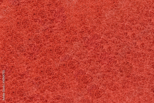 Close-up of Red synthetic fibrous surface photo