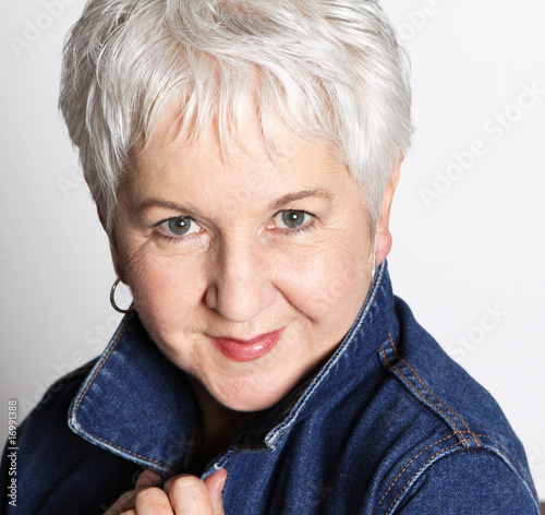 Pretty Senior Woman in Denim Jacket