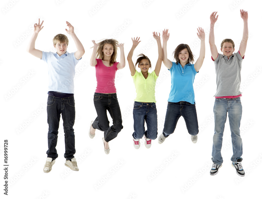 Group of Teenage Friends Jumping in Studio Group of Teenage Friends Jumping in Studio